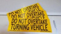 Do not overtake turning vehicle T2706